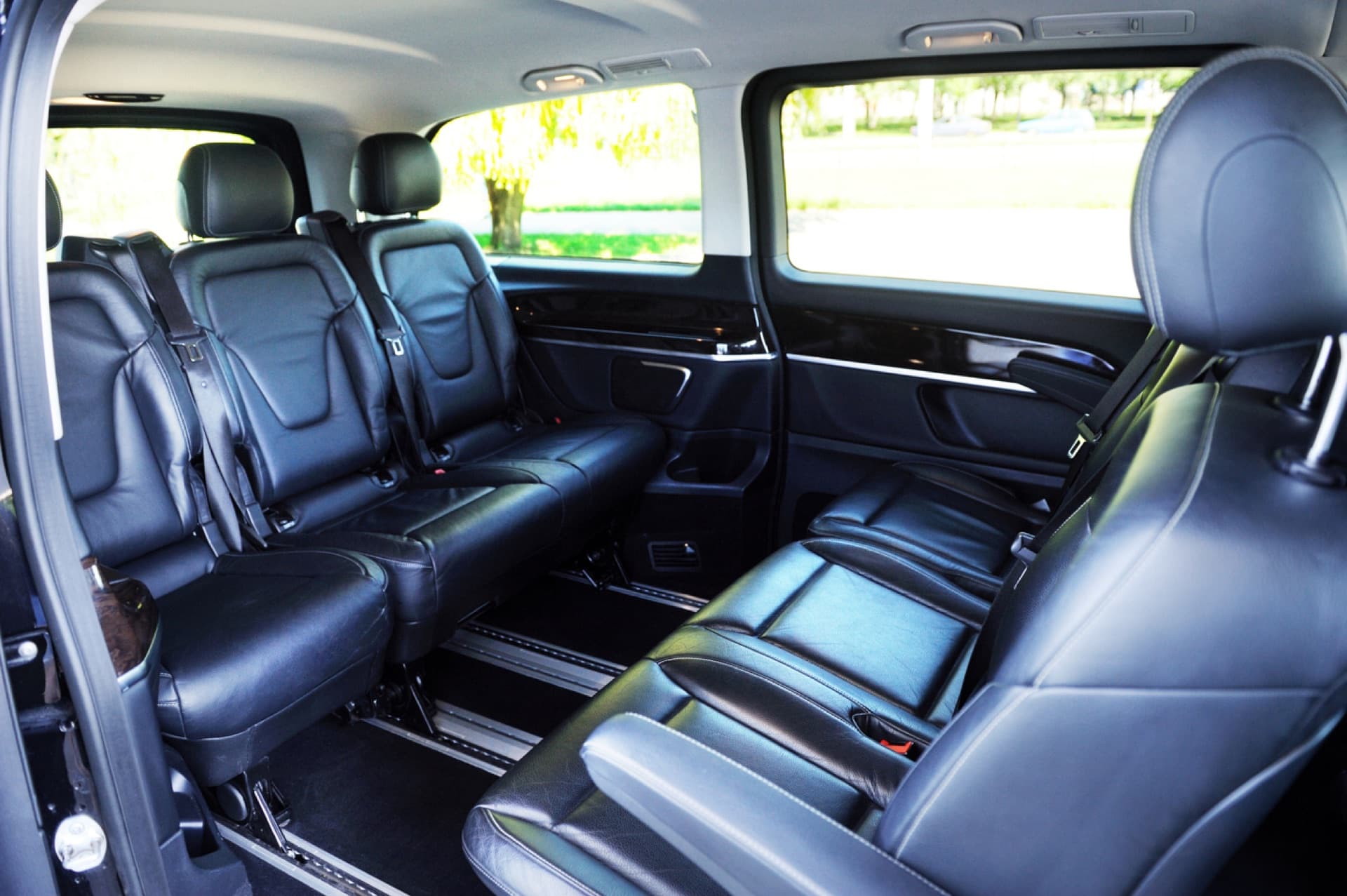 Black leather seating inside the Mercedes luxury van
